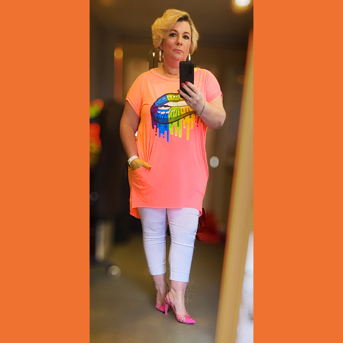 LONG DIPPED HEM TOP RAINBOW LIPS AND SIDE POCKETS