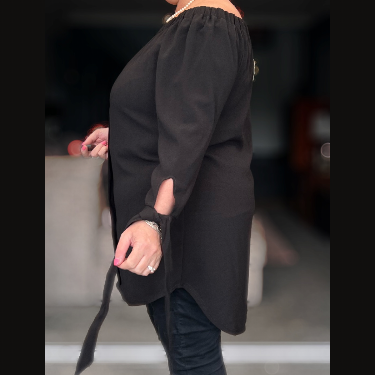 OFF SHOULDER LONG LENGTH DIPPED HEM TOP WITH TIE SLEEVES