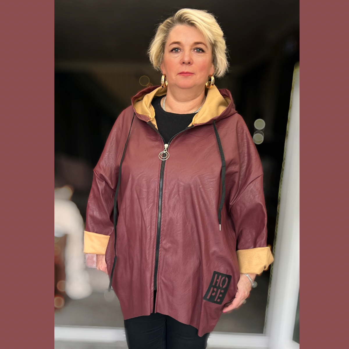 Faux Leather Dipped Hem Jacket / Coat