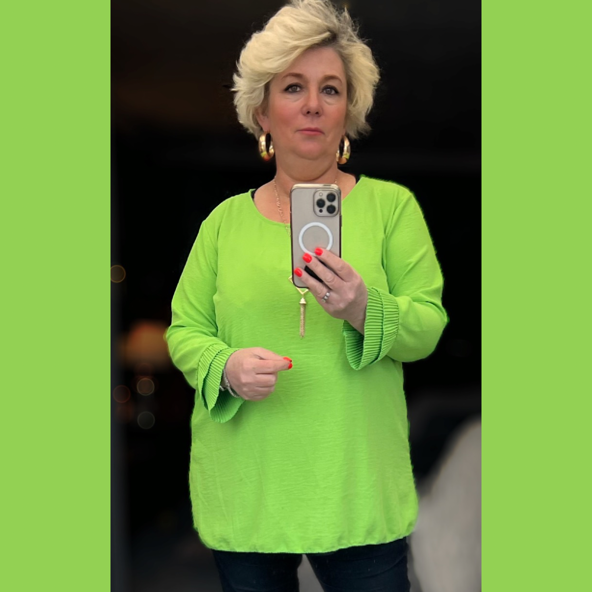 Straight Cut blouse with frilled cuffs and necklace