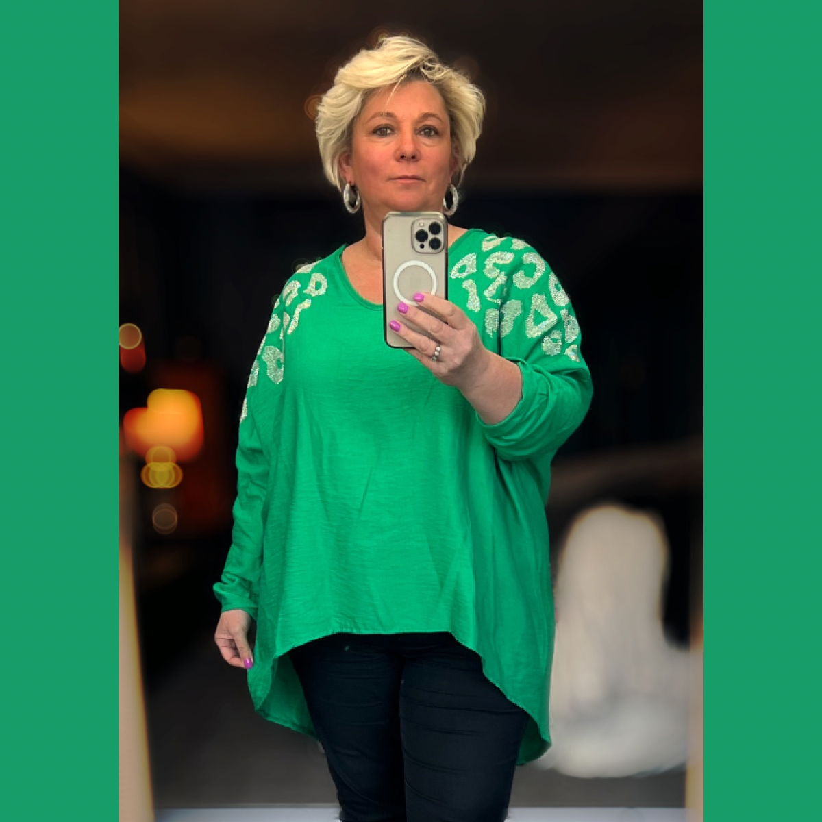 ROCKTHOSECURVES LOOSE FITTING DIPPED HEM TOP WITH STUDDED SHOULDERS
