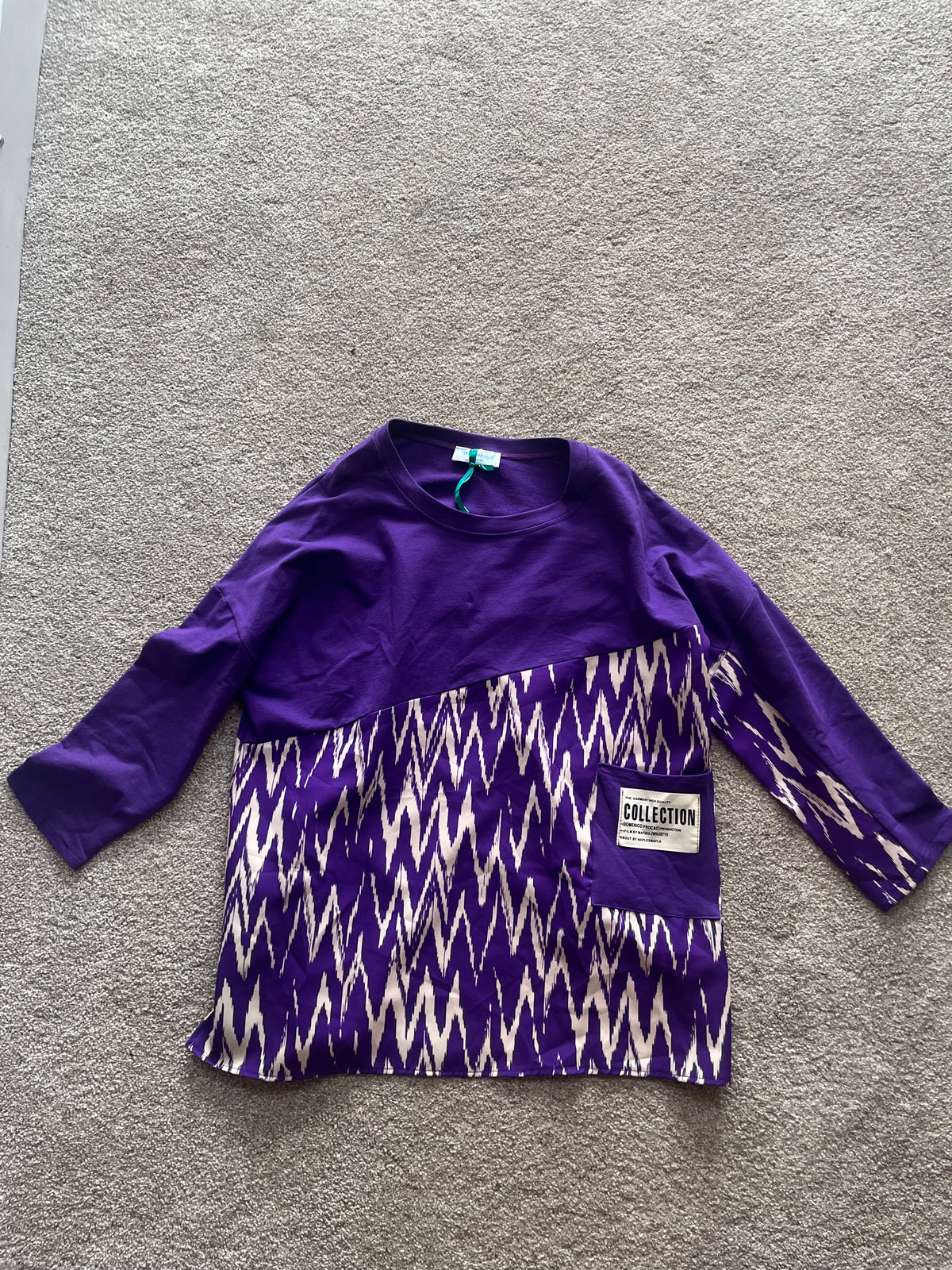 lon top with zig zag pattern on bottom half