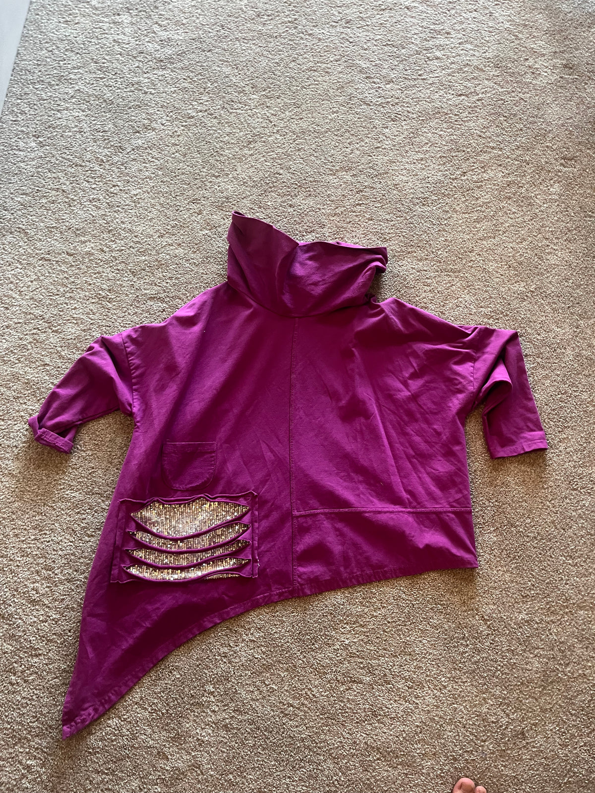 Oversized hoodie/poncho dipped hem (side) sequins + rips