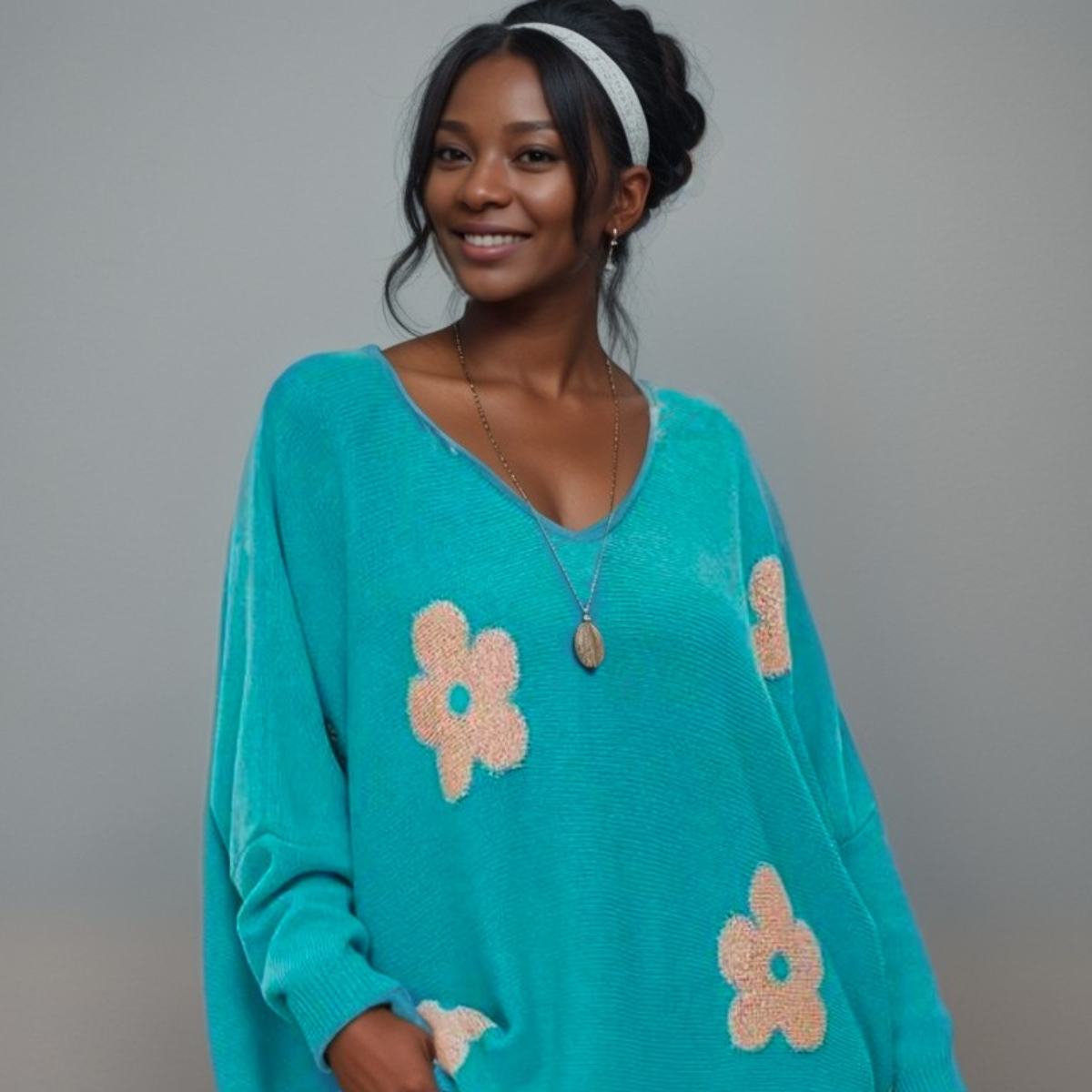 TEAL V NECK JUMPER WITH FLOWERS