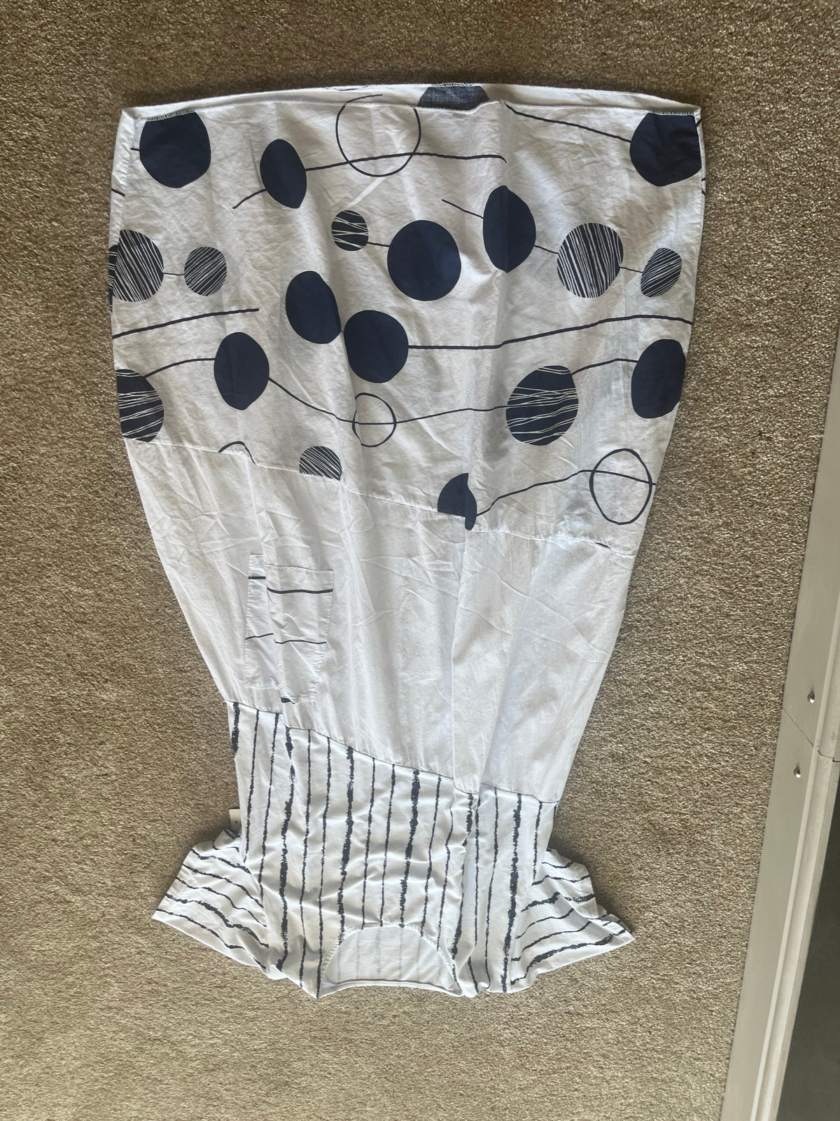white dress with navy pattern