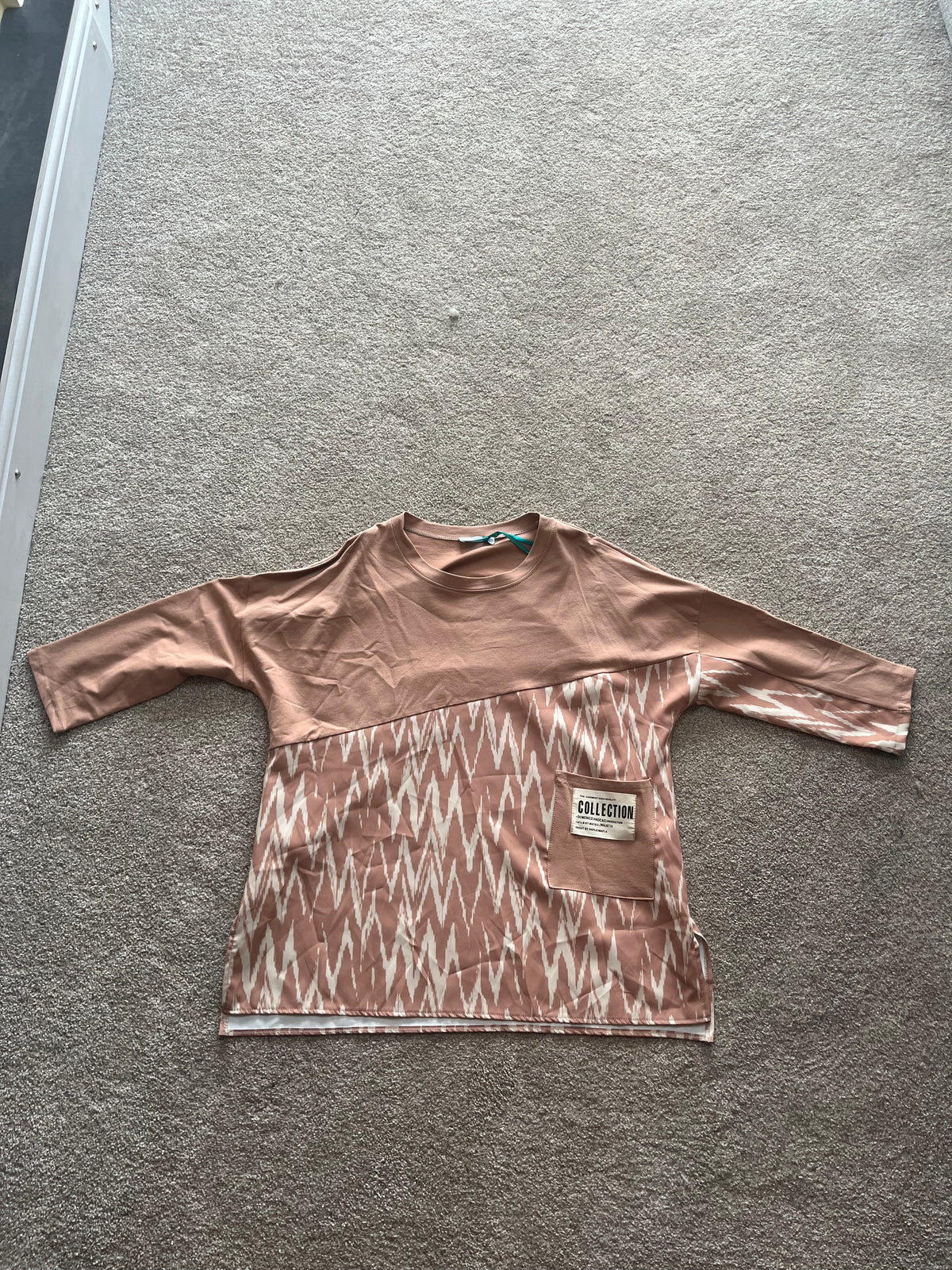lon top with zig zag pattern on bottom half
