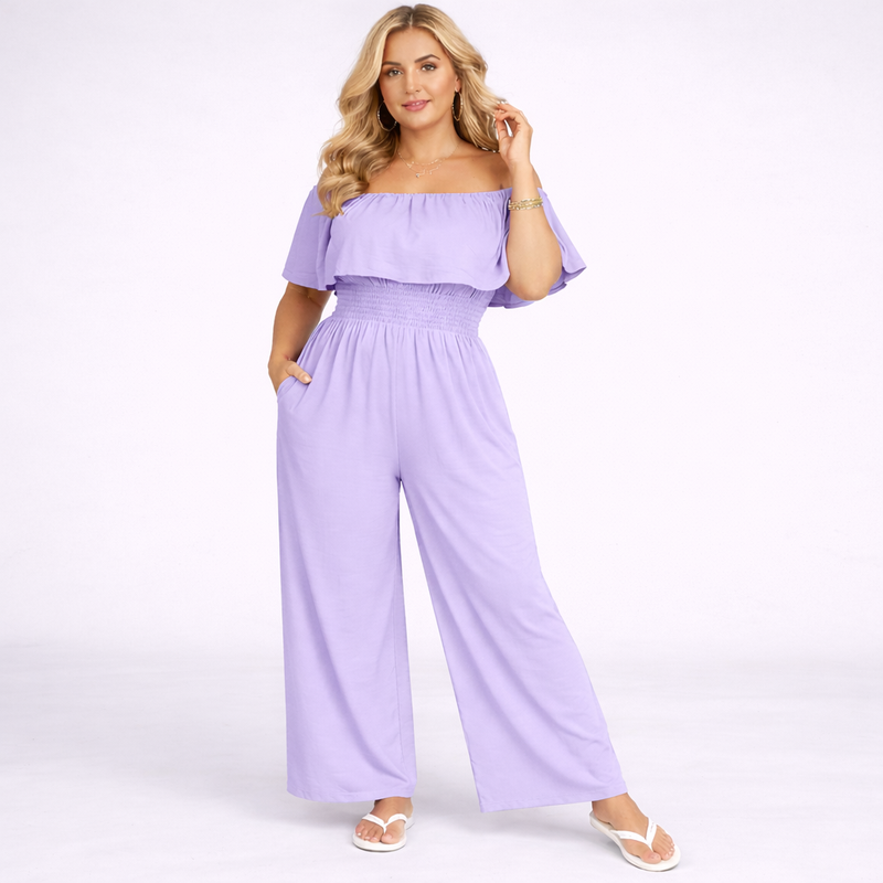 Woman wearing a lavender off-shoulder jumpsuit on a white background