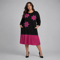 Black Dress with Applique and Pleated Skirt