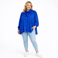 Dipped Hem Tie Neck Loose Fitting Blouse