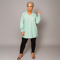 Smocked V‑Neck Long Sleeve Blouse