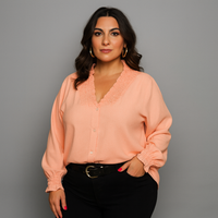 Smocked V‑Neck Long Sleeve Blouse