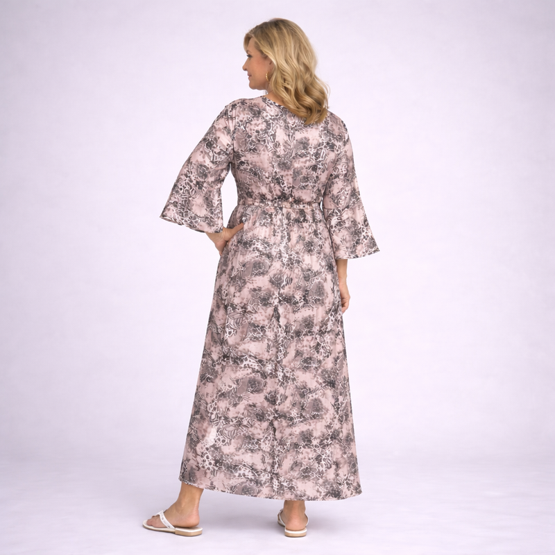 Woman wearing a floral dress on a white background