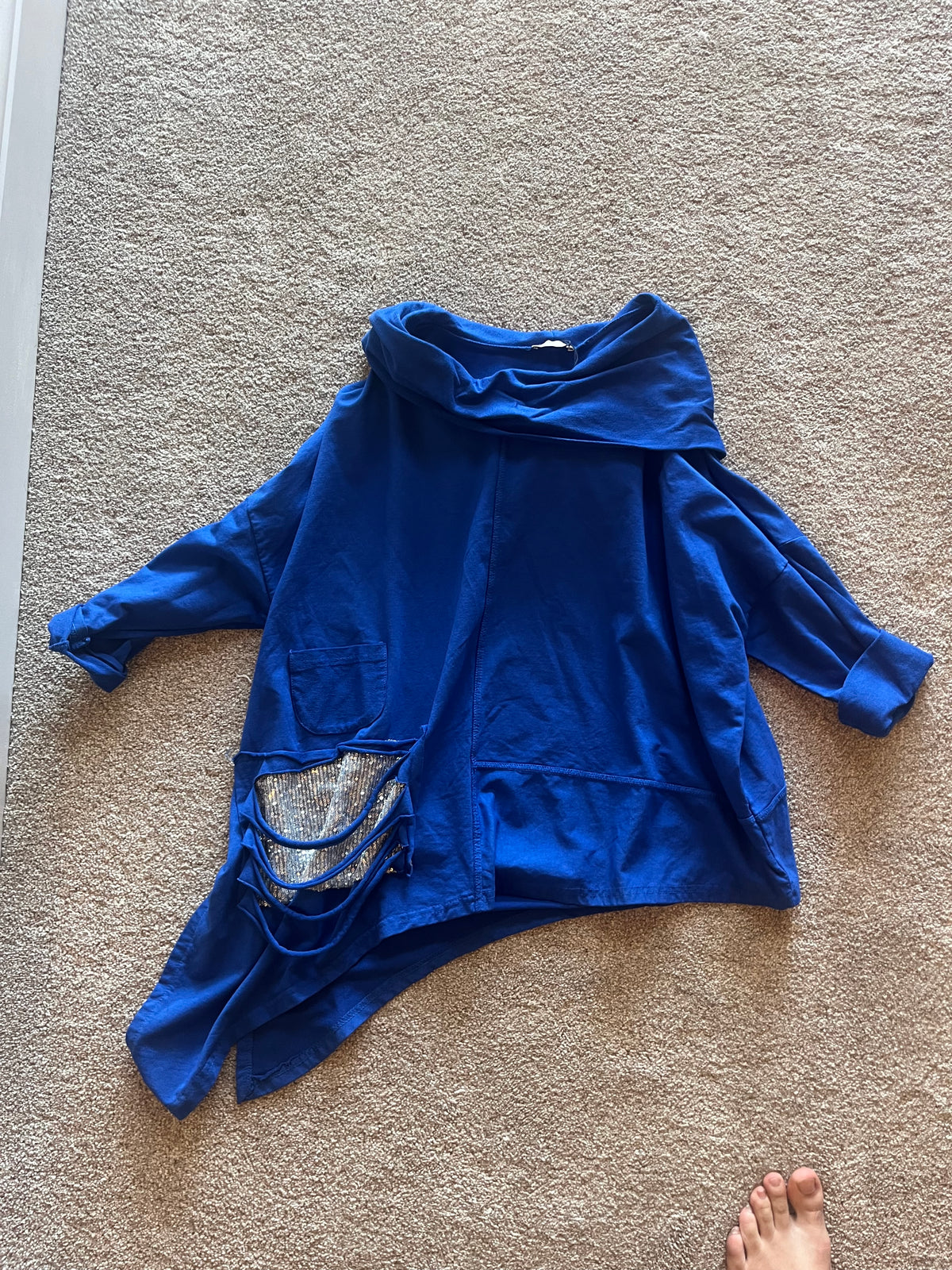 Oversized hoodie/poncho dipped hem (side) sequins + rips