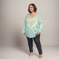 OVERSIZED V-NECK JUMPER WITH LARGE GOLD HEART