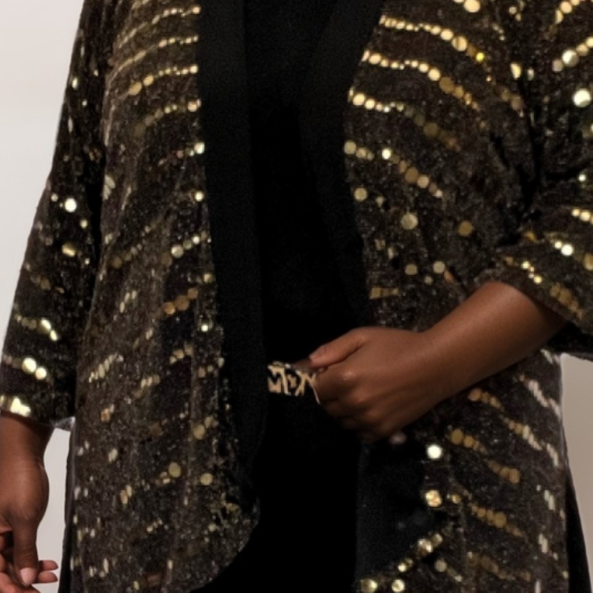 OPEN FRONT SEQUIN JACKET WITH FLARED PANELS