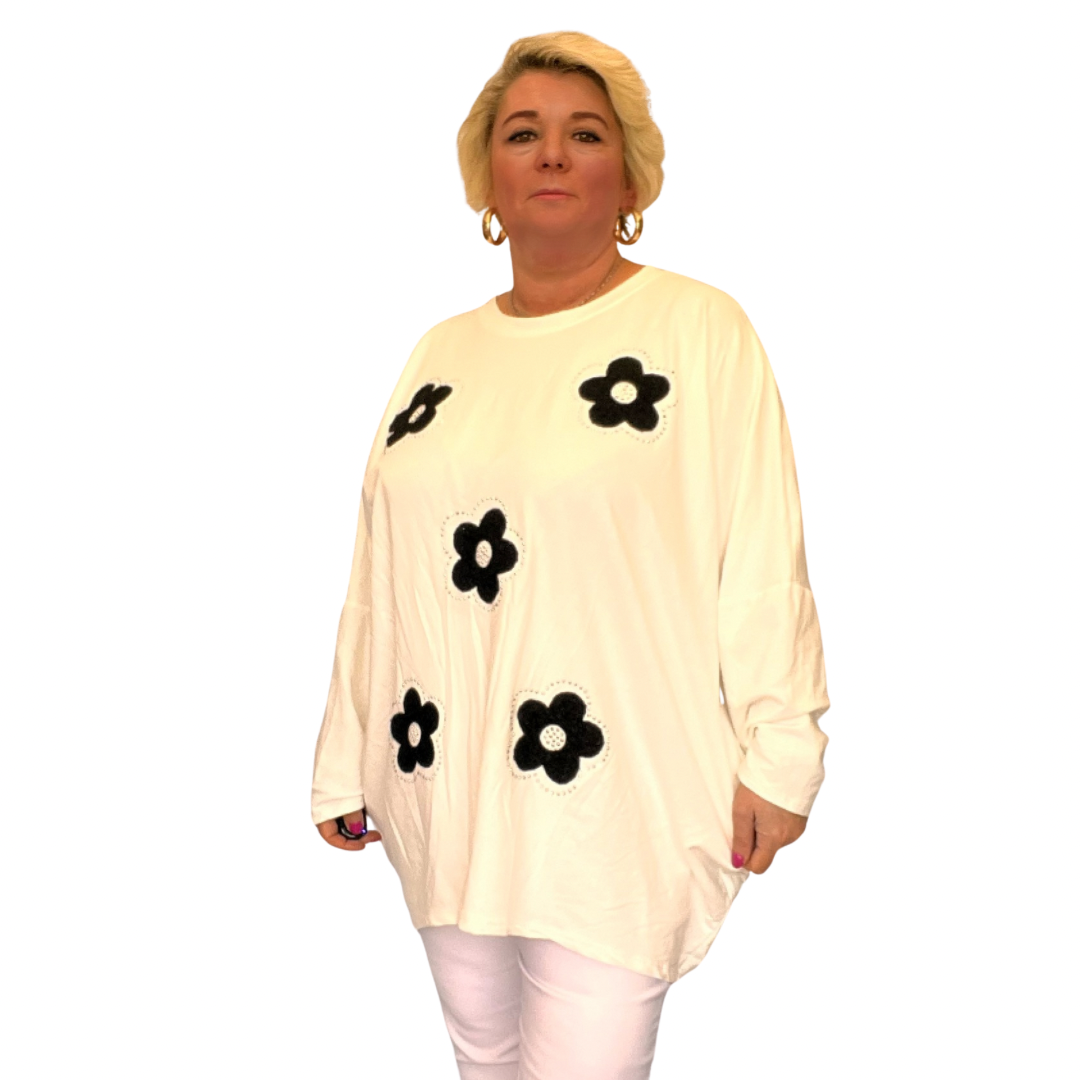 ROCKTHOSECURVES APPLIQUE FLOWER DIPPED HEM LONG SLEEVE TOP