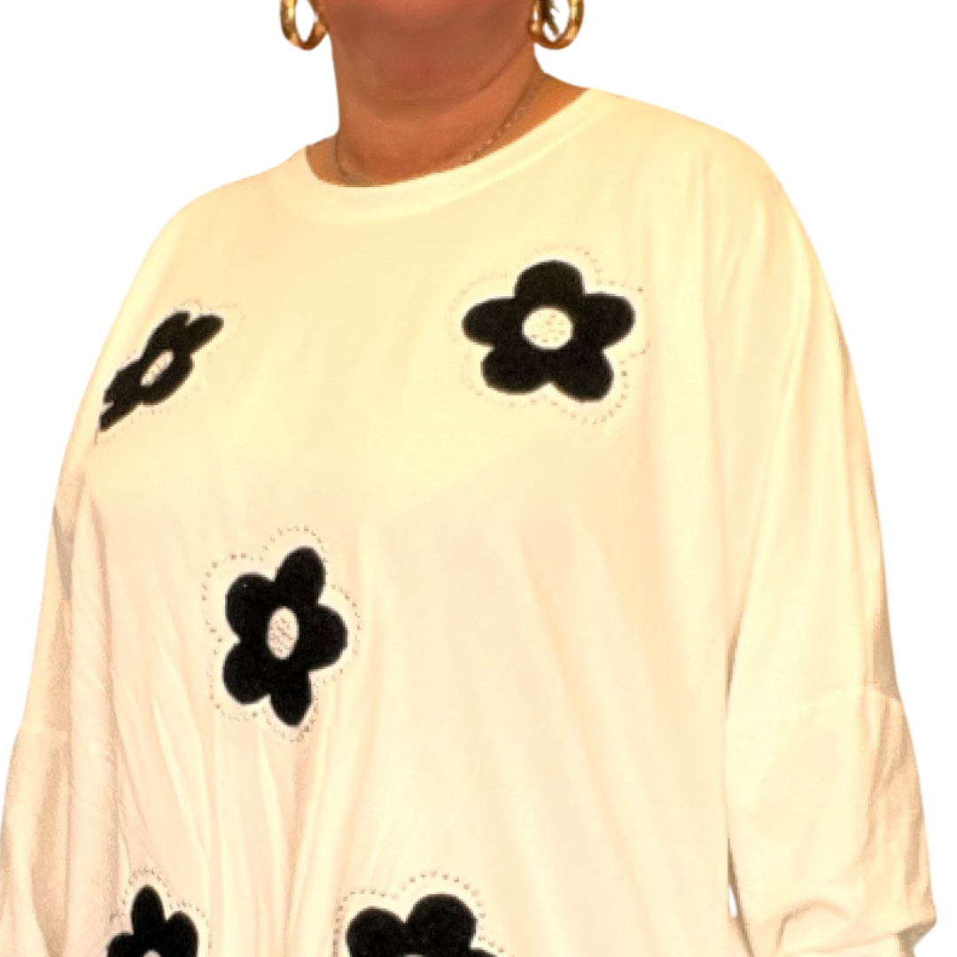 ROCKTHOSECURVES APPLIQUE FLOWER DIPPED HEM LONG SLEEVE TOP