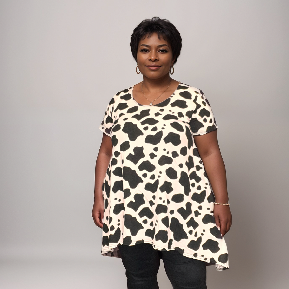 Plus‑Size Cow Print Short Sleeve Swing Top with Hanky Hem