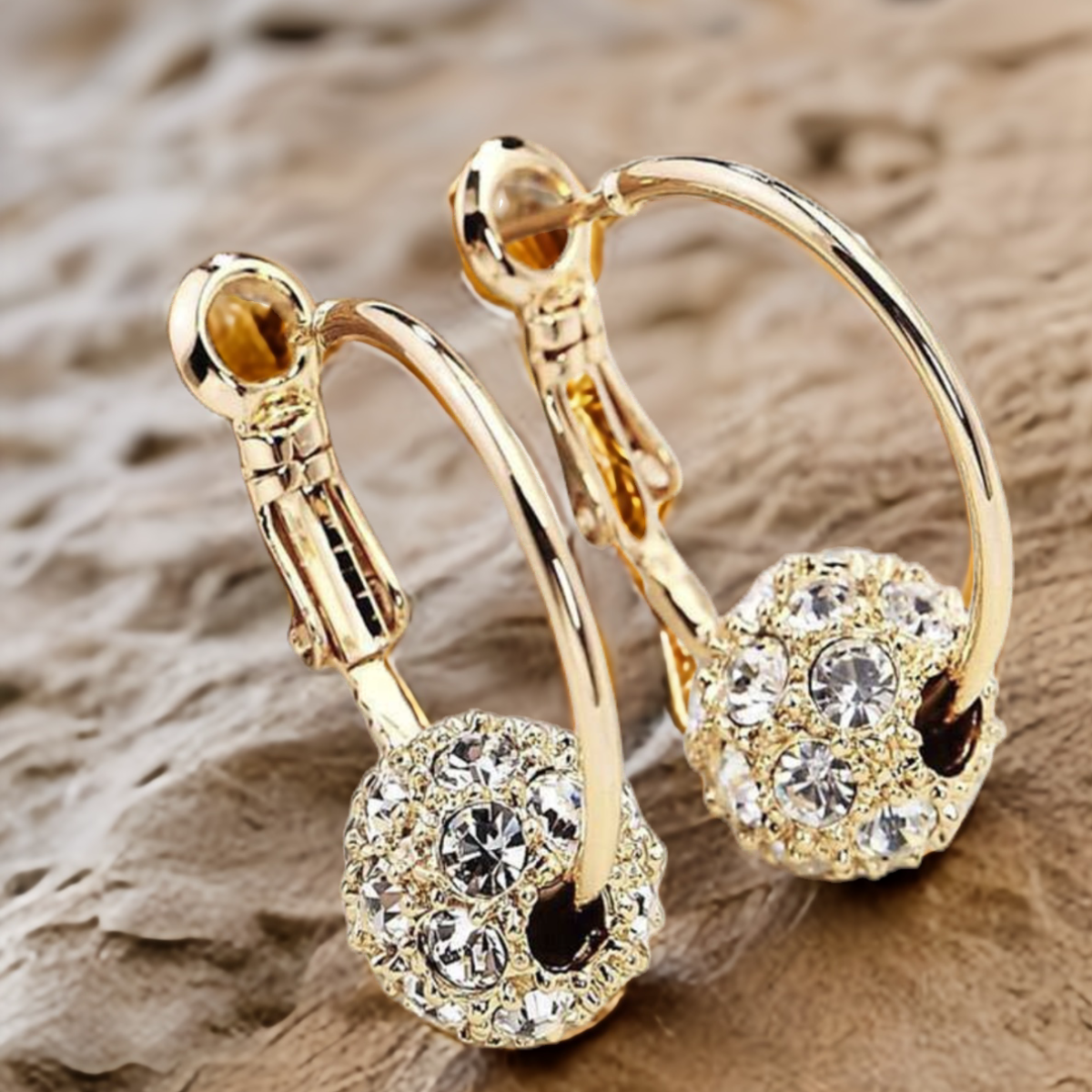 ROCKTHOSECURVES GOLD HOOP EARRINGS WITH SPARLKY BALL