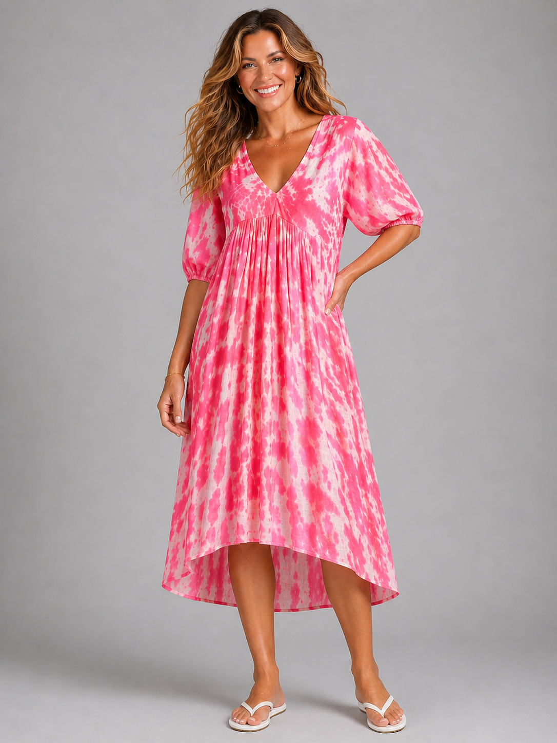 Pink tie dye cotton dress with dipped hem