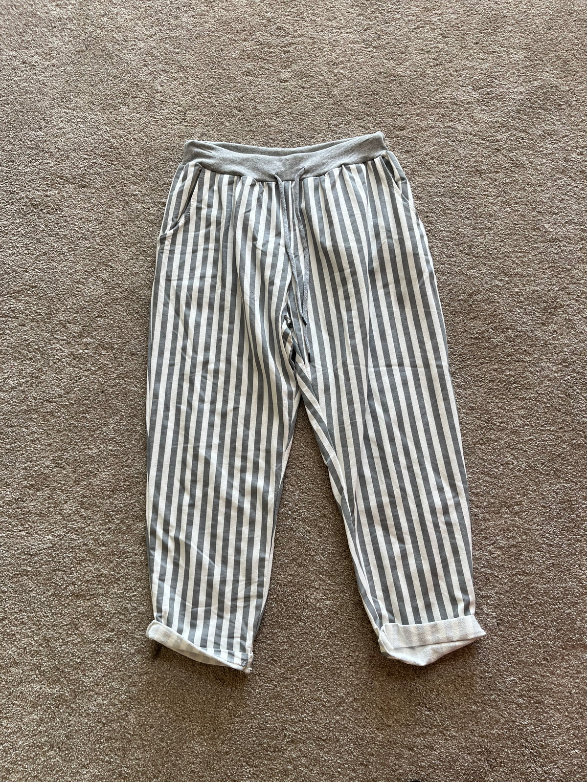 white and grey striped joggers