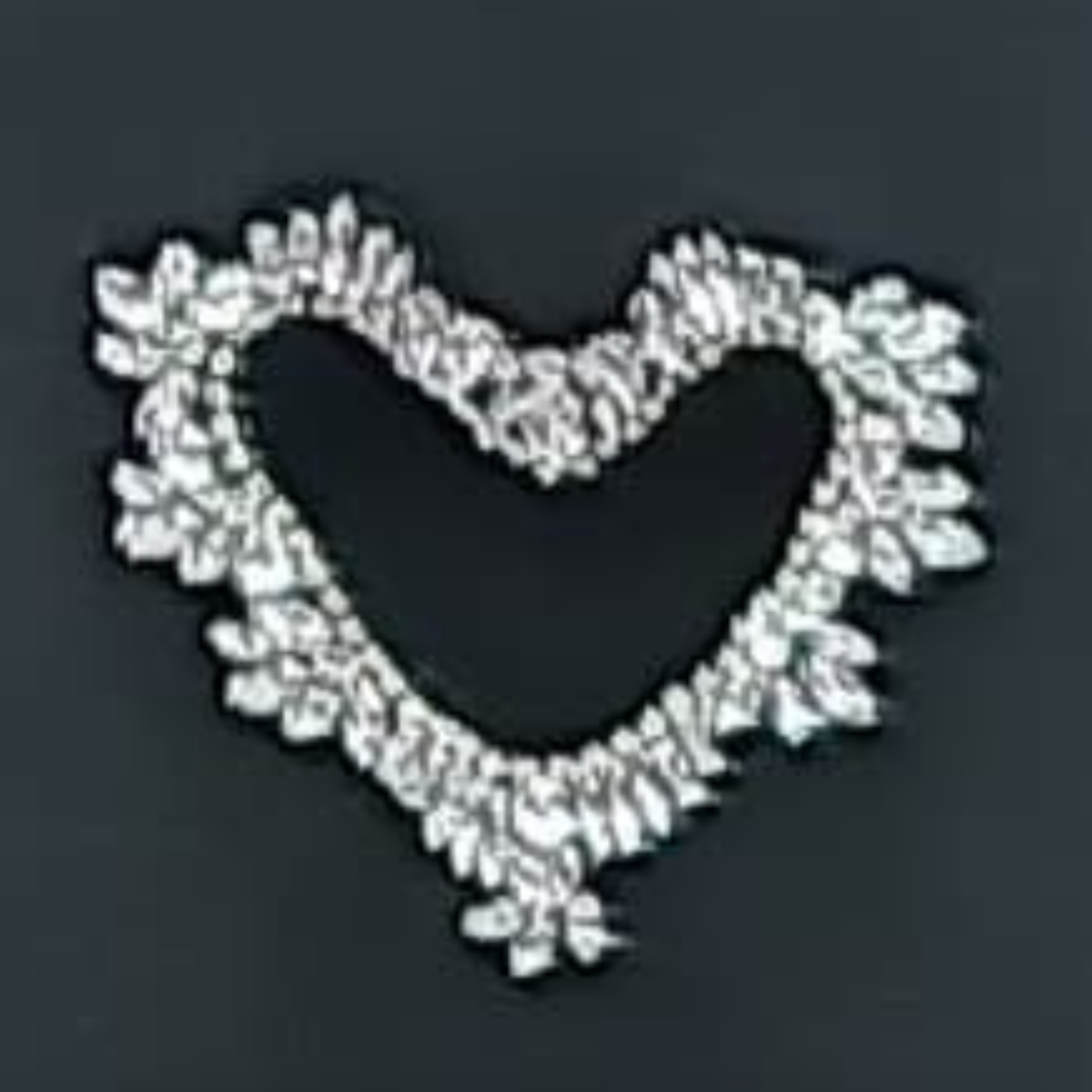 ROCKTHOSECURVES LUXURY TASSLE JUMPER WITH SILVER JEWEL HEART