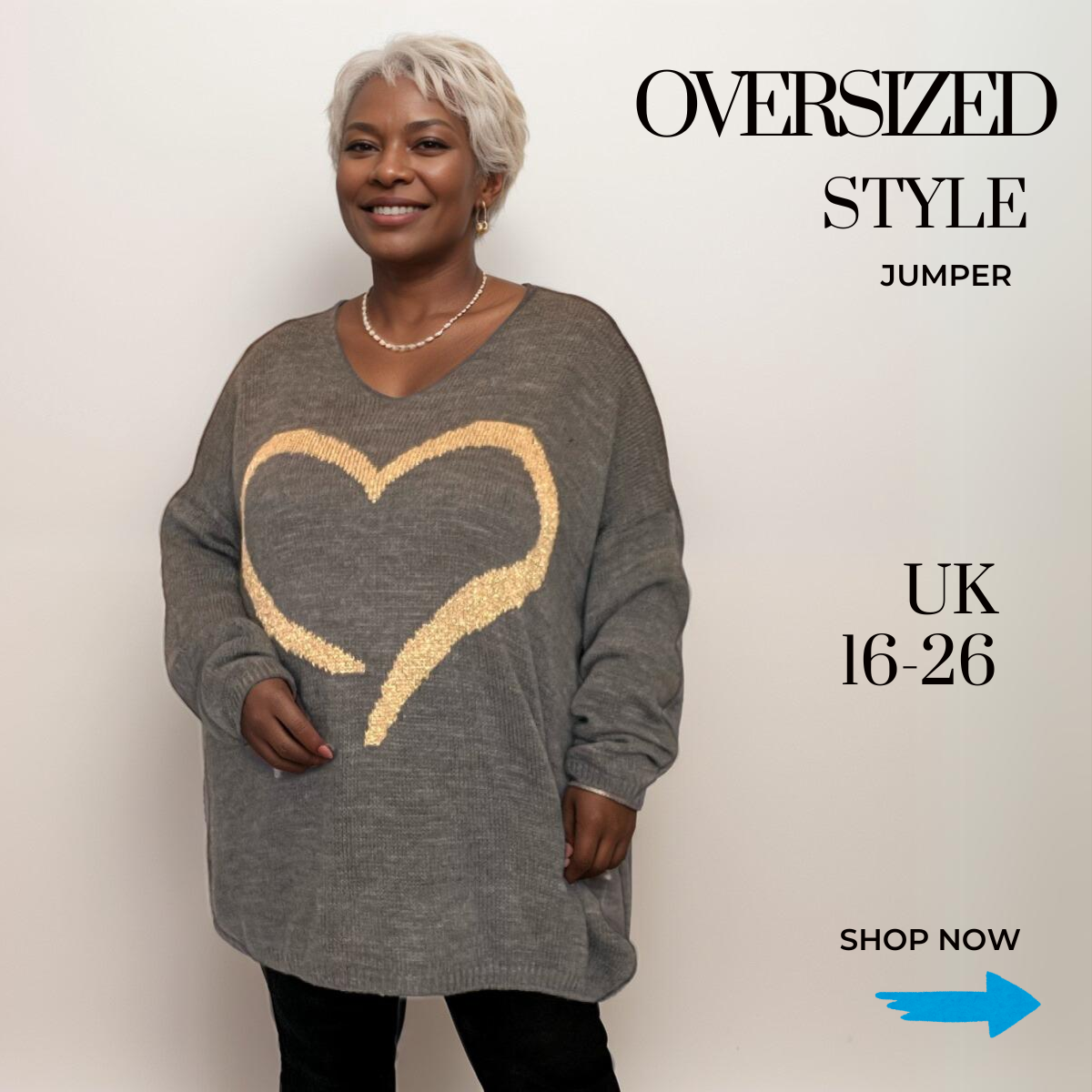 OVERSIZED V-NECK JUMPER WITH LARGE GOLD HEART