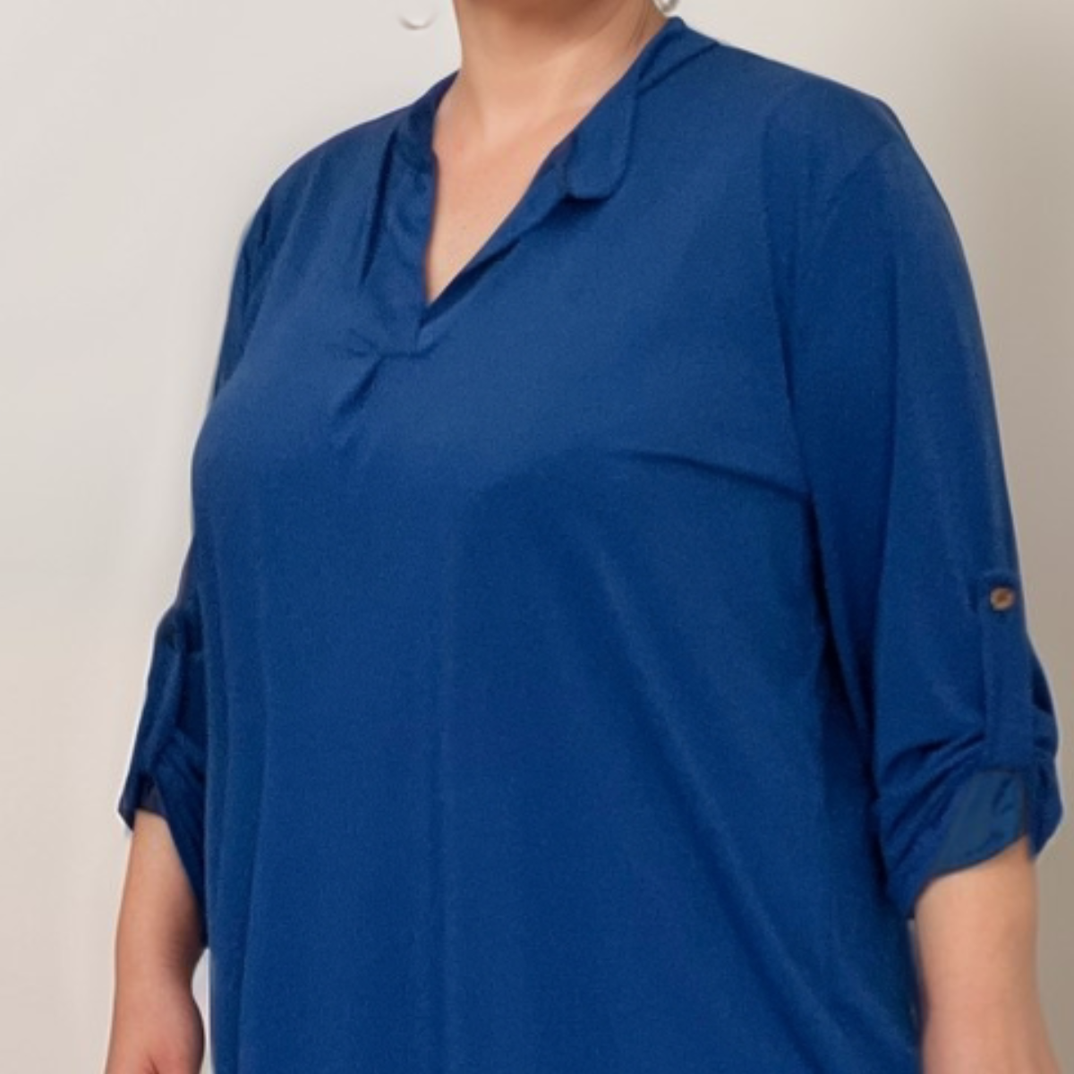 Plus‑Size V‑Neck Long Dipped Hem Top with Button Sleeves