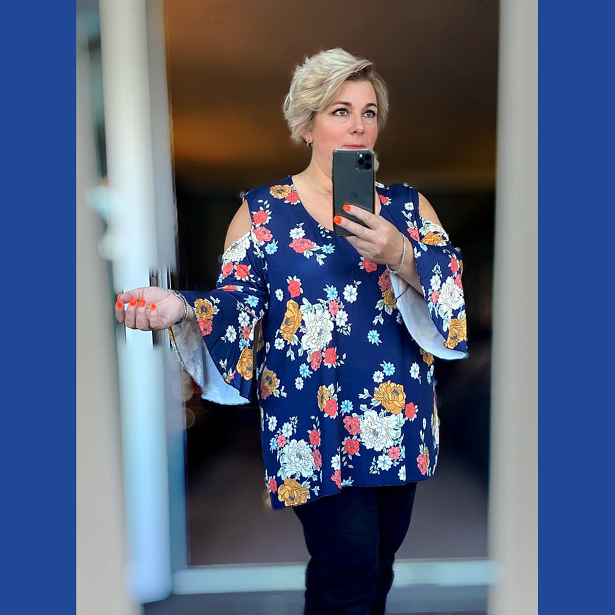 Open shoulder blouse with 1/2 bell sleeves