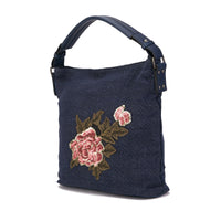 Fabric handbag with embroidered flower