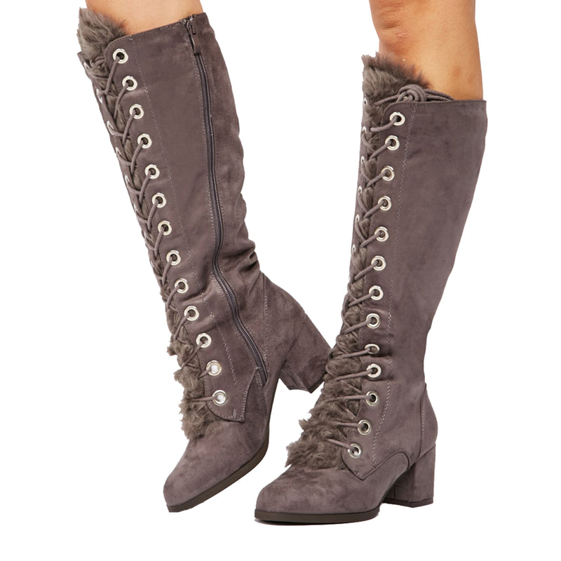 Low block heel knee length boots with furry tongue