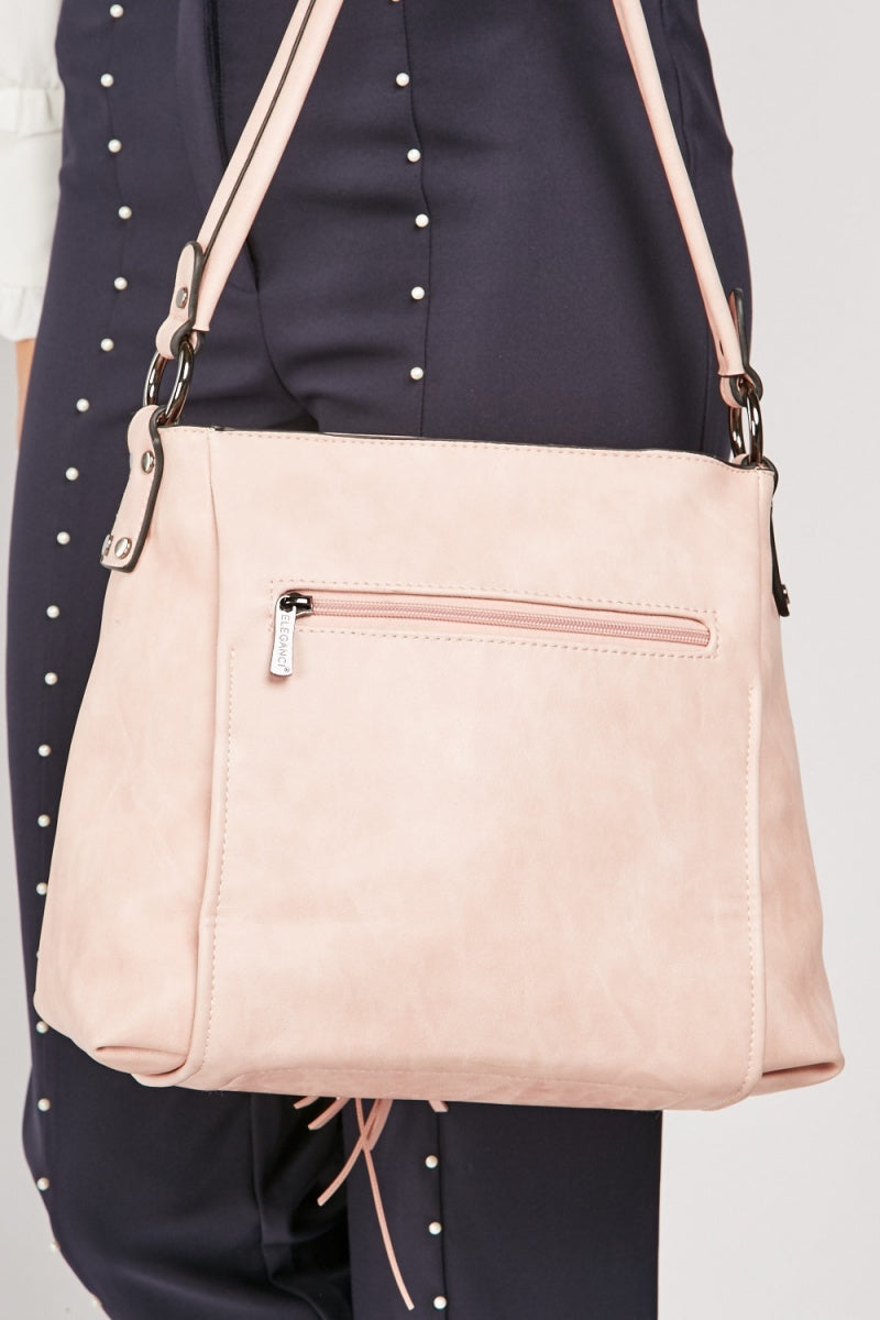 Faux leather Pink handbag with tassel circle